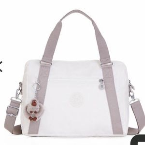 Beautiful Kipling purse in Lacquer pearl color. New with tags!